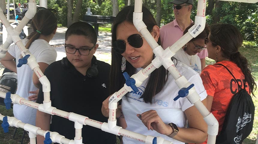 Carollo Cares event pipe experiment with water