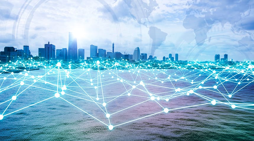 Water with a skyline and technology grid over water