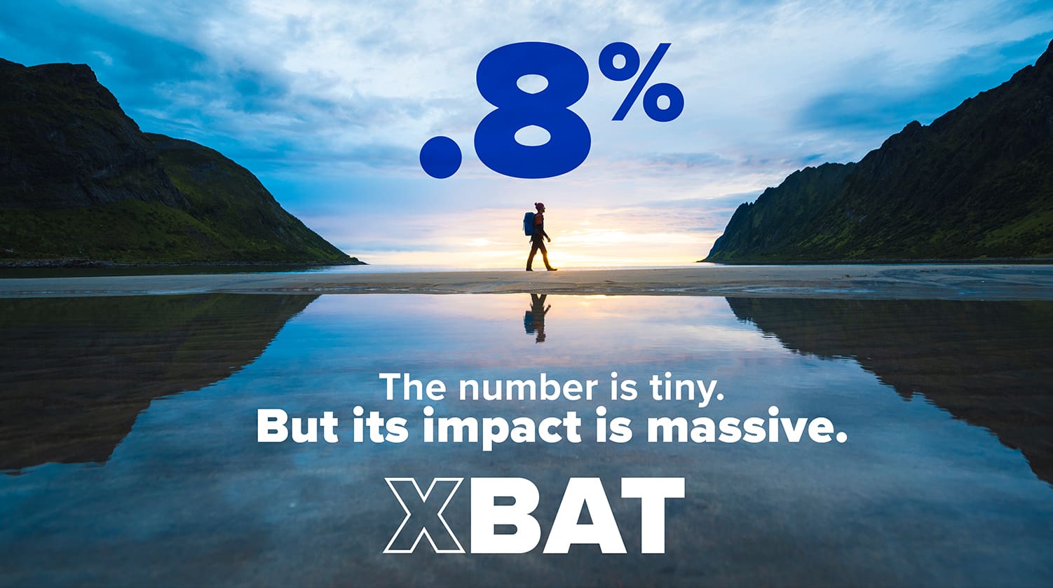 person walking with reflection in water