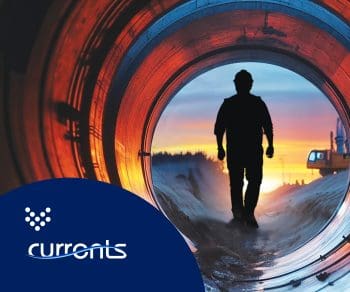 Cover of Currents Volume 1, 2025, of a man standing in a water pipe. Carollo Engineers