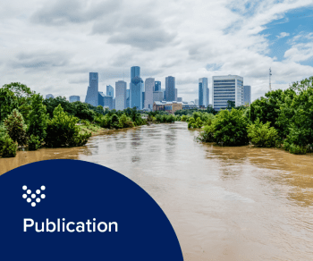photo of a bridge over a small river with people running on a path along the water that represents Carollo's Resilience and Sustainability practice.