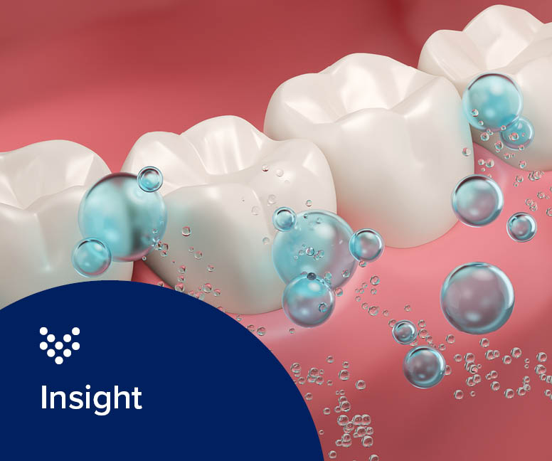graphic of water bubbles floating over teeth representing fluorinated drinking water.
