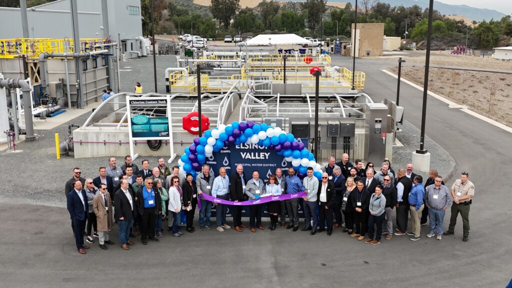 Photo of a large group of people at the ribbon cutting for the Arial photo of the Horsethief Canyaon Water Reclamation Facility completed by Carollo Engineers